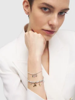 Charm U in oro bianco 18kt con diamanti