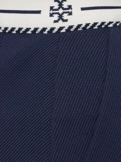 Minigonna in nylon plissé con logo
