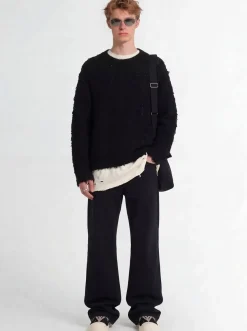 Pantaloni Geth in denim cerato