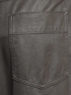 Pantaloni spalmati