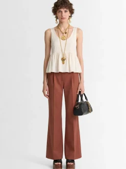 Top in seta a pois jacquard