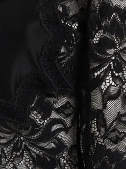 Top stretch con pizzo