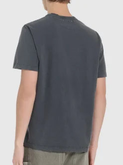 T-shirt in jersey di cotone distressed con logo